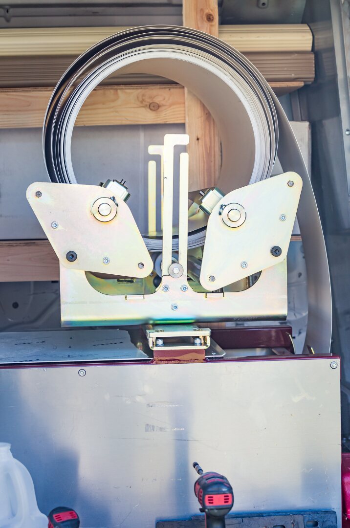 Rear view of mobile gutter-forming equipment